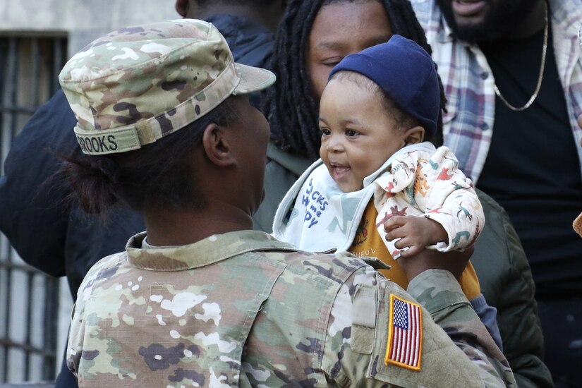 U.S. Soldiers with Headquarters and Headquarters Battalion, 28th Infantry Division, and their families are honored during a deployment ceremony at Zembo Shrine Auditorium Oct. 9, 2022, in Harrisburg, Pa. These Soldiers are deploying to the Middle East for a year in support of Operation Spartan Shield.
