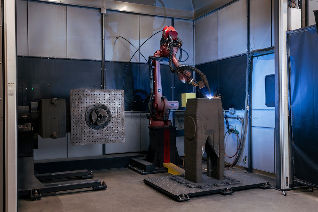 The largest U.S. civil works component produced by 3D printer was printed by Lincoln Electric for use in the Poe Lock ship arrestor rehabilitation project at the Soo Locks in Sault Ste. Marie, Michigan. Lincoln Electric and USACE developed an additive print strategy to print the part in two pieces, one approximately 4,000 pounds and the other 2,000 pounds, made from high-strength, low-alloy steel (HSLA), then weld them together at their Baker Industries facility located in metro Detroit