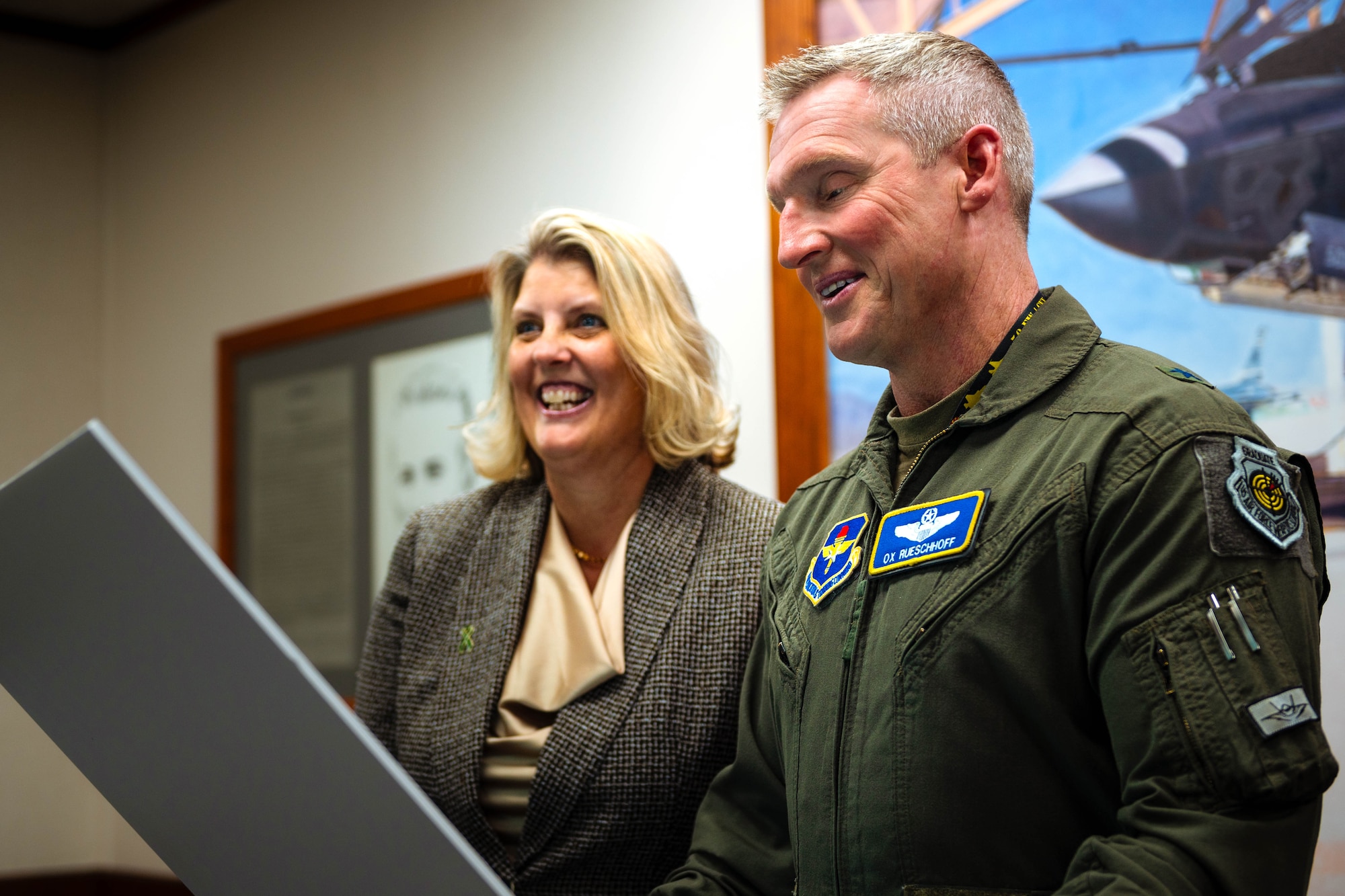 Jennifer Schoen, 56th Fighter Wing sexual assault response coordinator, and U.S. Air Force Brig. Gen. Jason Rueschhoff, 56th Fighter Wing commander, read a proclamation dedicating the month of April as the Sexual Assault Prevention and Response month.