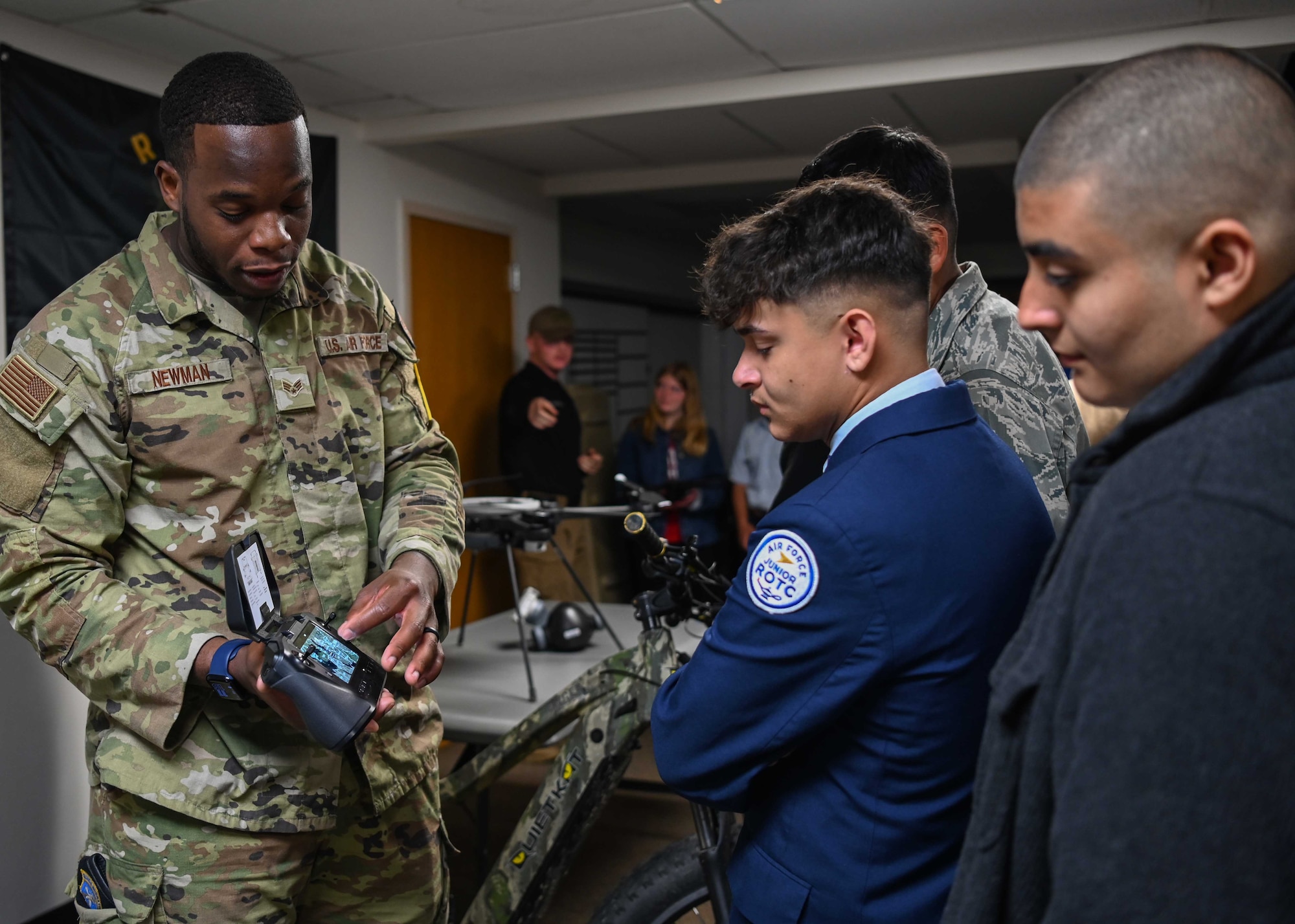 A 30th Security Forces Squadron Reconnaissance patrolmen, shows the Oxnard High School JROTC cadets how the Skydio X2D reconnaissance tool operates during a tour at Vandenberg Space Force Base.