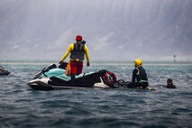 Lifeguards operate a rescue watercraft during a rescue Watercraft Risk Technician Course at Marine Corps Base Hawaii, March 6, 2024. The course provided lifeguard instructors from across the Pacific an opportunity to learn new rescue watercraft techniques. (U.S. Marine Corps photo by Lance Cpl. Samuel Estridge)