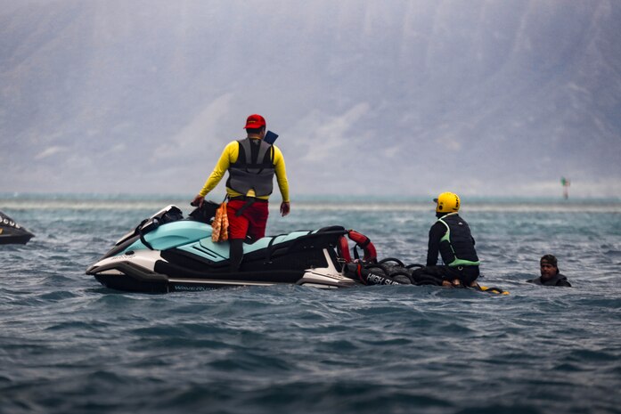 Lifeguards operate a rescue watercraft during a rescue Watercraft Risk Technician Course at Marine Corps Base Hawaii, March 6, 2024. The course provided lifeguard instructors from across the Pacific an opportunity to learn new rescue watercraft techniques. (U.S. Marine Corps photo by Lance Cpl. Samuel Estridge)