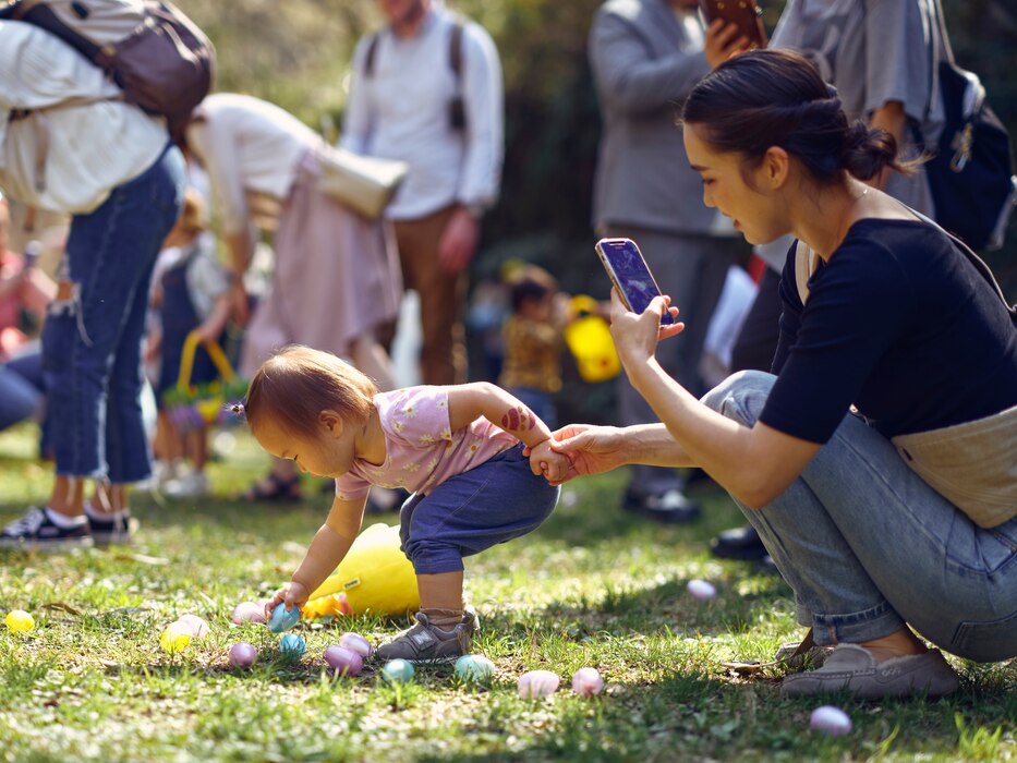 Children and their parents participate in an egg hunt at Commander, Fleet Activities Yokosuka's Ikego West Valley Campground March 31, 2024 during Egg'Stravaganza.