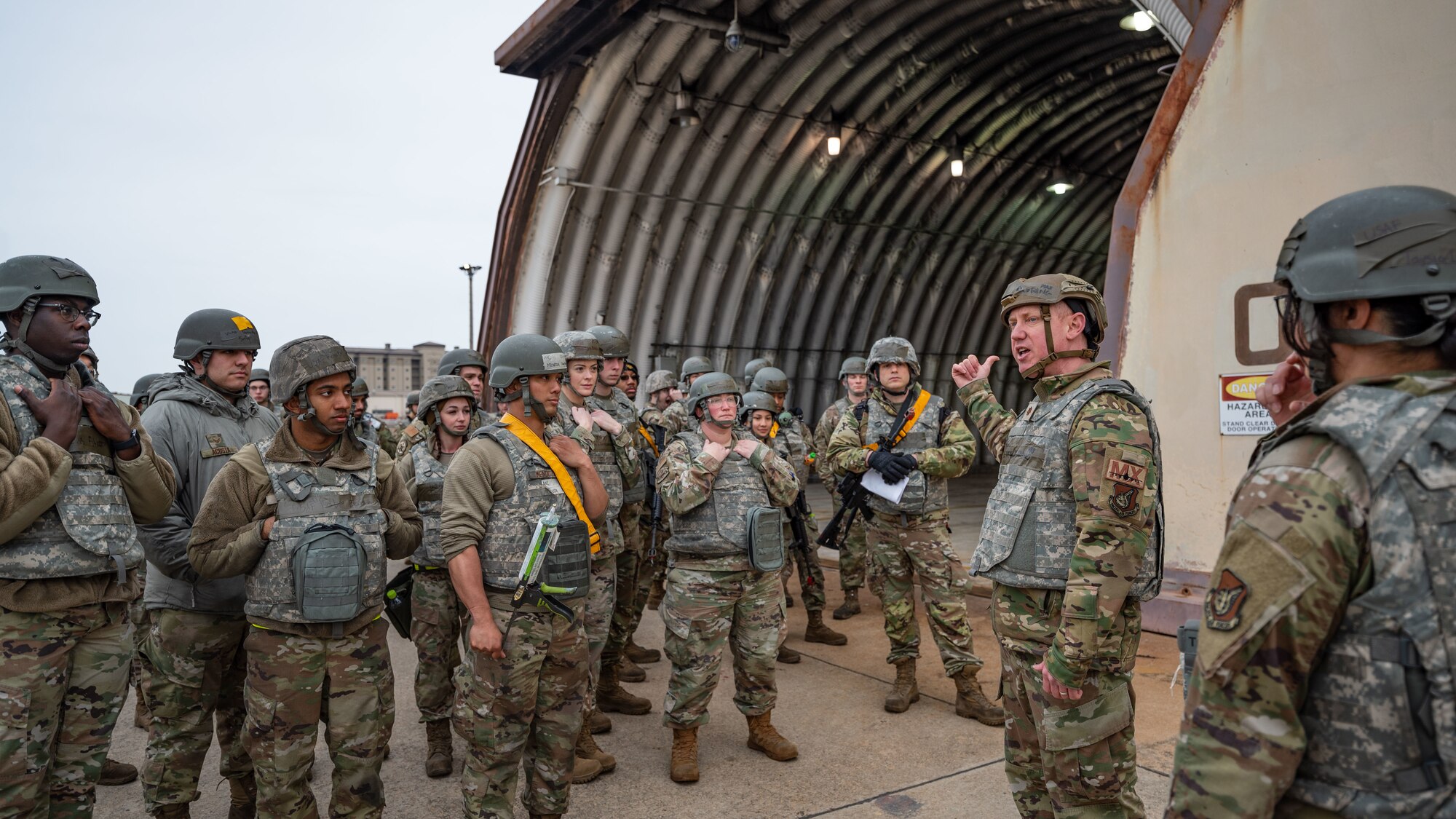 Maj. Keith Deering instructs 80th FGS Airmen of the importance of defending base assets.