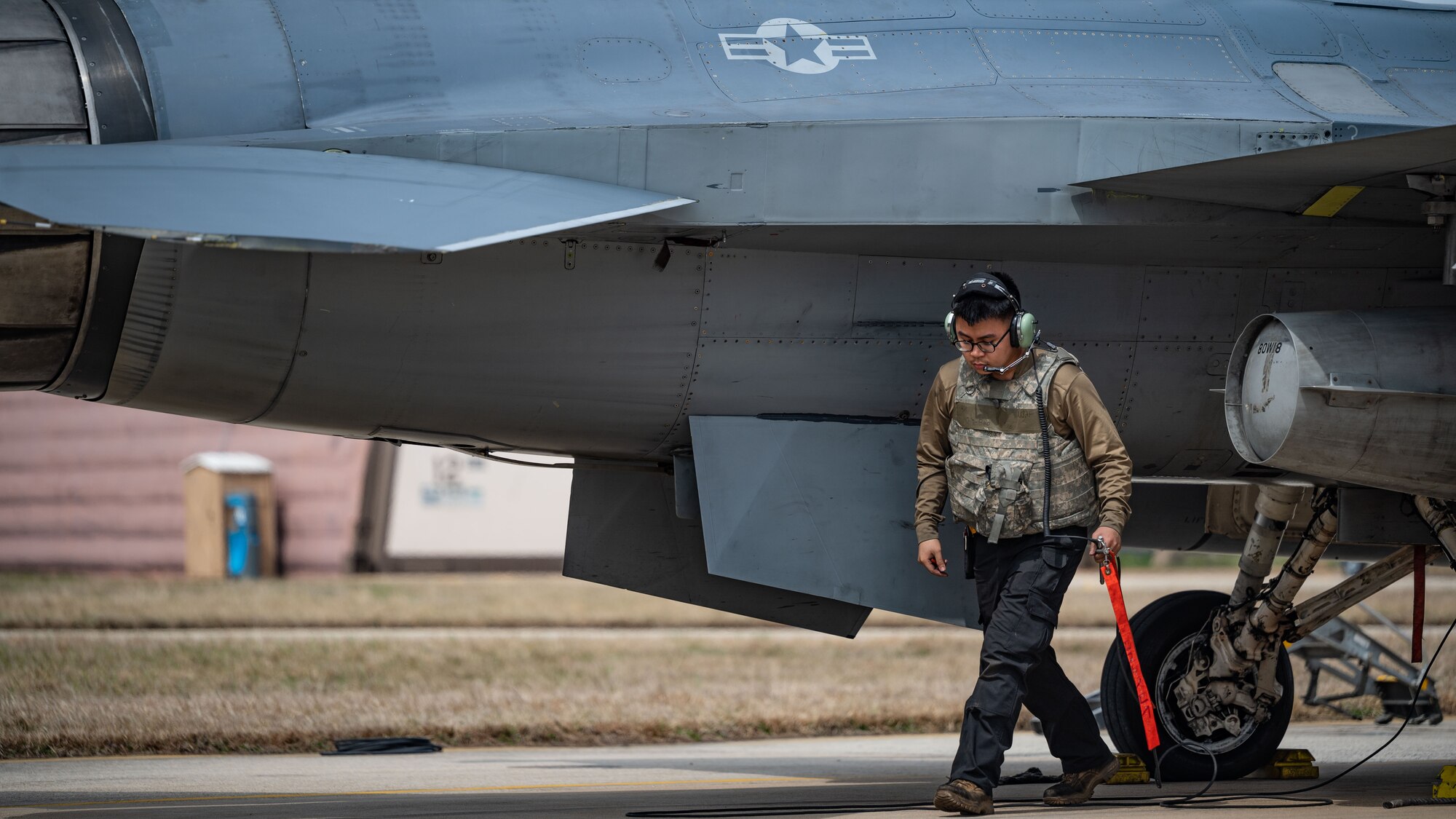Airman 1st Class Gia-Bao Do conducts preflight procedures before launching.