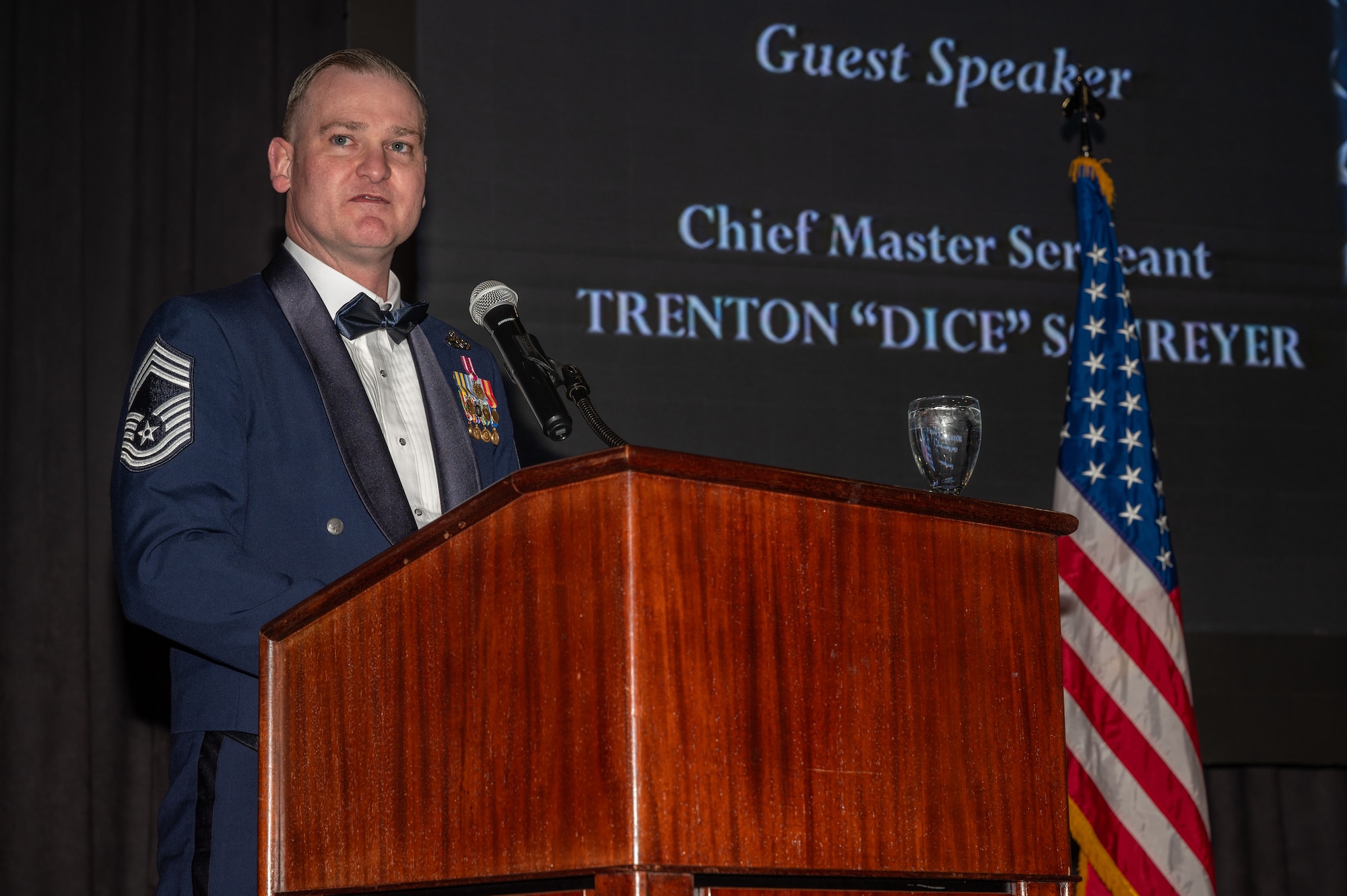 U.S. Air Force Chief Master Sgt. Trenton Schreyer, 36th Fighter Generation Squadron senior enlisted leader, delivers a speech during an Airman Leadership School graduation at Osan Air Base, Republic of Korea, March 21, 2024. Schreyer spent five weeks mentoring the students on professionalism, leadership skills and future management capabilities to better prepare them for the challenges they may face when leading Airmen. (U.S. Air Force photo by Airman 1st Class Chase Verzaal)