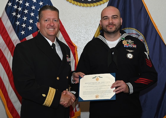 JOINT BASE SAN ANTONIO-FORT SAM HOUSTON – (Jan. 19, 2024) – Hospital Corpsman 1st Class Robert Ortiz, of Orlando, Fla., assigned to Naval Medical Forces Support Command (NMFSC) was recognized by Rear Adm. Walter Brafford, commander, as the command’s Fiscal Year 2023 Sailor of the Year at NMFSC headquarters. NMFSC develops and delivers integrated education and training that produces operational medical experts to project Medical Power in support of Naval Superiority. (U.S. Air Force photo by Taylor Curry, 502 Air Base Wing Public Affairs/Released)