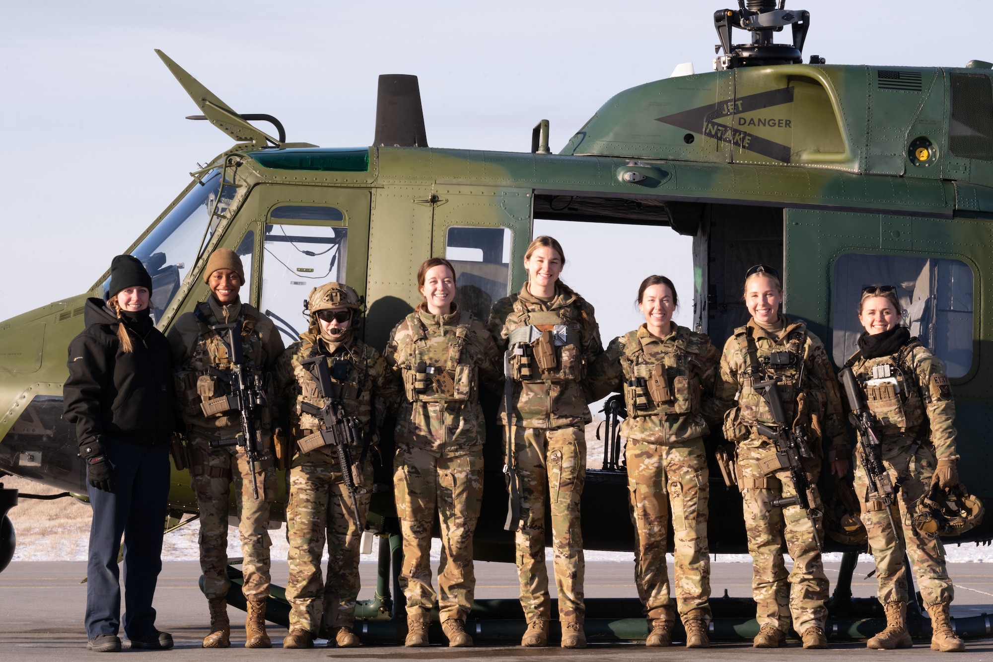 U.S. Air Force Capt. Tessa Favo, 54th Helicopter Squadron copilot, conducts a pre-flight inspection on a UH-1N Iroquois helicopter at Minot Air Force Base, North Dakota, Mar. 28, 2024. The 54HS assembled an all women flight as part of Team Minot’s celebration of Women’s History Month. (U.S. Air Force photo by Airman 1st Class Trust Tate)