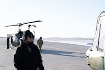 Civ. Rachael Duchsherer, 54th Helicopter Squadron aircraft maintainer, does a UH-1N Iroquois helicopter pre-flight inspection for their all-women flight at Minot Air Force Base, North Dakota, Mar. 28, 2024. The 54HS assembled an all women flight as part of Team Minot’s celebration of Women’s History Month. (U.S. Air Force photo by Airman 1st Class Trust Tate)