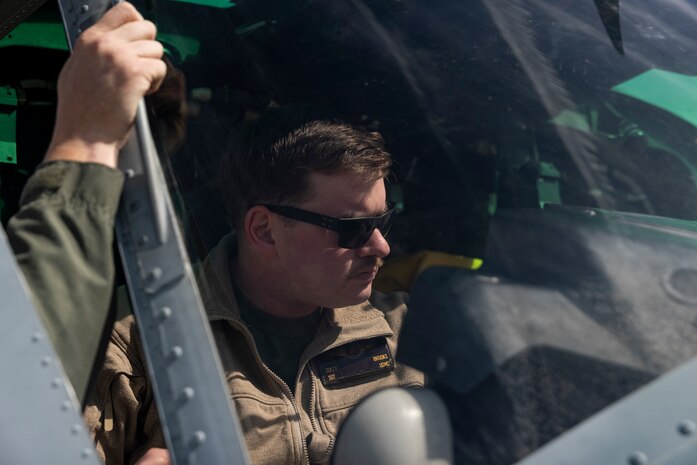 U.S. Marines with Marine Light Attack Helicopter Squadron (HMLA) 167 conduct precision-guided munitions delivery at maritime targets