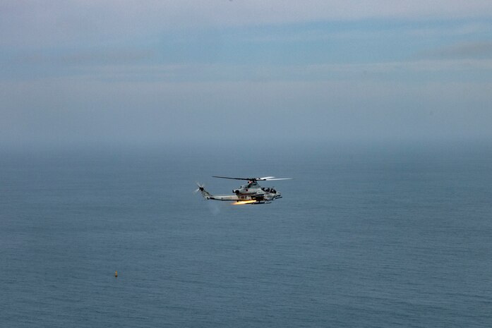 U.S. Marines with Marine Light Attack Helicopter Squadron (HMLA) 167 conduct precision-guided munitions delivery at maritime targets