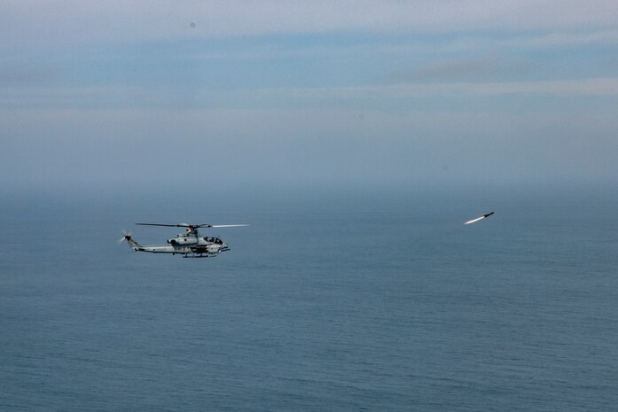 U.S. Marines with Marine Light Attack Helicopter Squadron (HMLA) 167 conduct precision-guided munitions delivery at maritime targets