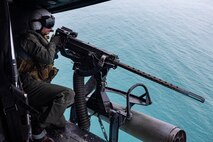 U.S. Marines with Marine Light Attack Helicopter Squadron (HMLA) 167 conduct precision-guided munitions delivery at maritime targets