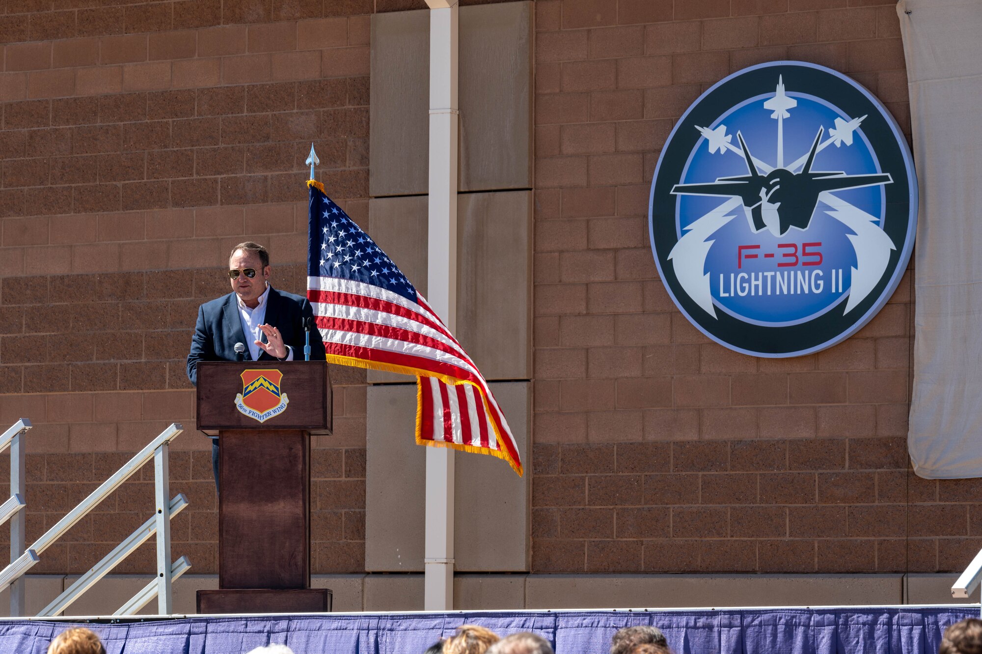 Retired U.S. Air Force Lt. Gen. Tom Jones, former deputy commander of U.S. Air Forces in Europe and Africa, gives remarks during the renaming ceremony of the Skip Hopler Fighter Training Center, March 29, 2024, at Luke Air Force Base, Arizona.