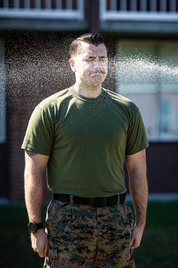 U.S. Marine Corps Warrant Officer Mason Shoemaker, a personnel officer with Headquarters and Support Battalion, Marine Corps Installations East-Marine Corps Base (MCB) Camp Lejeune, gets sprayed with oleoresin capsicum (O.C.) spray during a React Force Training course on MCB Camp Lejeune, North Carolina, March 29, 2024. The O.C. spray training strengthened the Marines’ ability to suppress a threat in the event of being exposed to the substance. (U.S. Marine Corps photo by Lance Cpl. Loriann Dauscher)