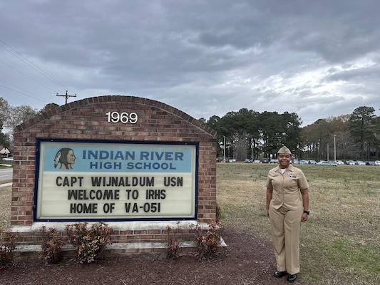 Capt. Kathryn Wijnaldum, the officer in charge of the surface propulsion mobile training team assigned to Commander, Naval Air Force Atlantic (CNAL), spoke to students attending Indian River High School Air Force Junior Reserve Officer Training Corps (AFJROTC) in Chesapeake, March 27.