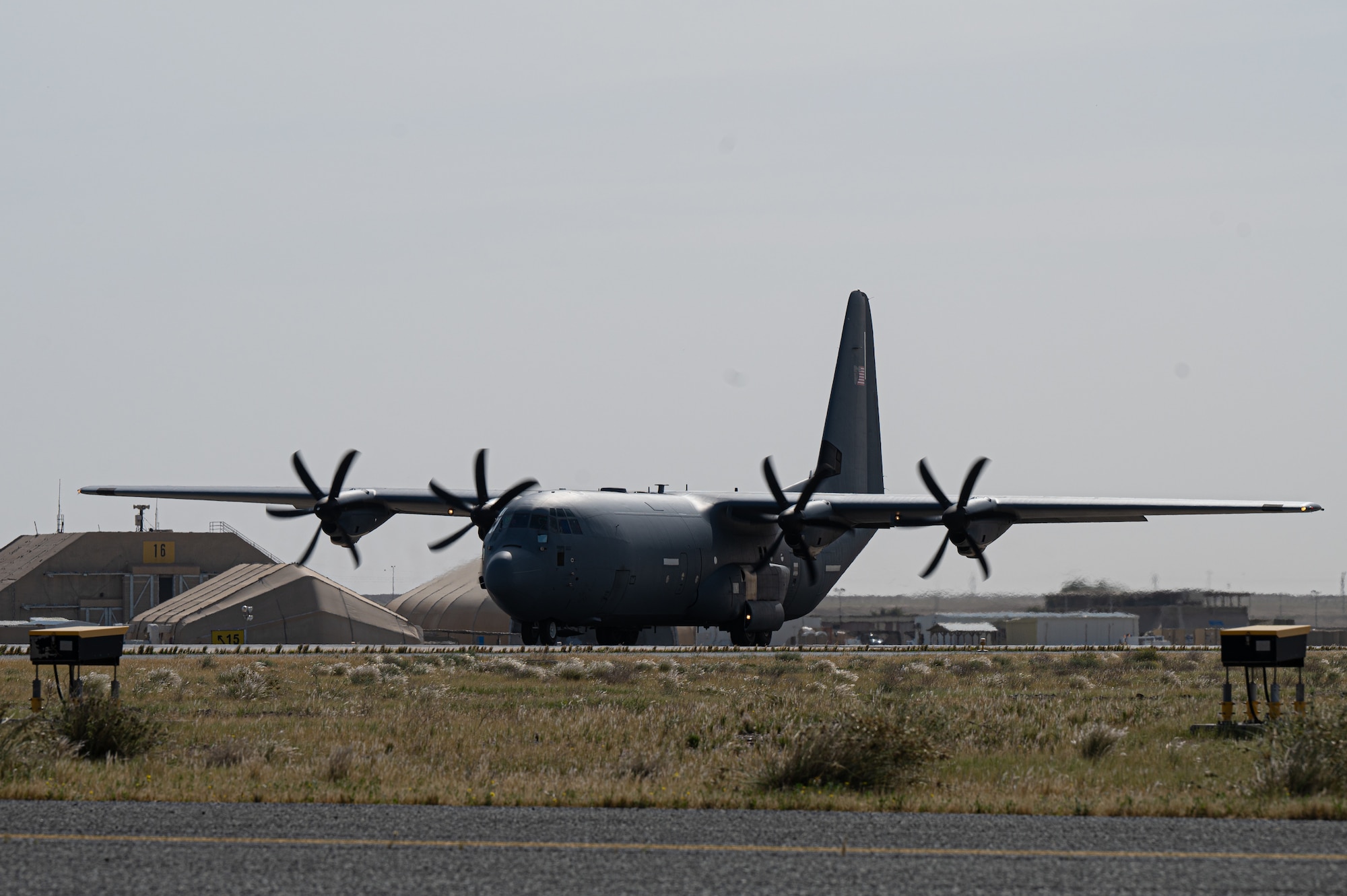 A C-130 aircraft loaded with humanitarian aid bound for airdrop over Gaza taxis for takeoff.