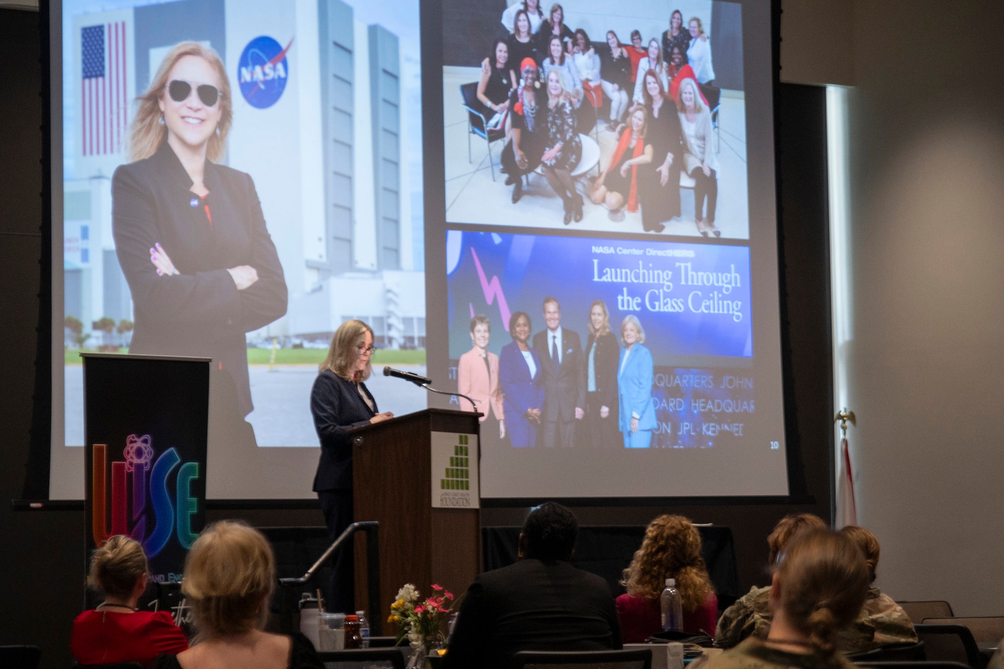 Janet Petro, Director of Kennedy Space Center, delivers her keynote address to the audience at the 2024 Women in Science and Engineering Symposium March 12 at the Space Coast Health Foundation in Rockledge, Fla.  Petro spoke about her journey from a student at Satellite High School in Brevard County, Fla., to graduating from the United States Military Academy at West Point, to ultimately becoming the top leader at KSC. The WiSE Symposium, hosted by the Air Force Technical Applications Center, is an annual event that encourages young women to pursue careers in science and technology. (U.S. Air Force photo by Matthew S. Jurgens)