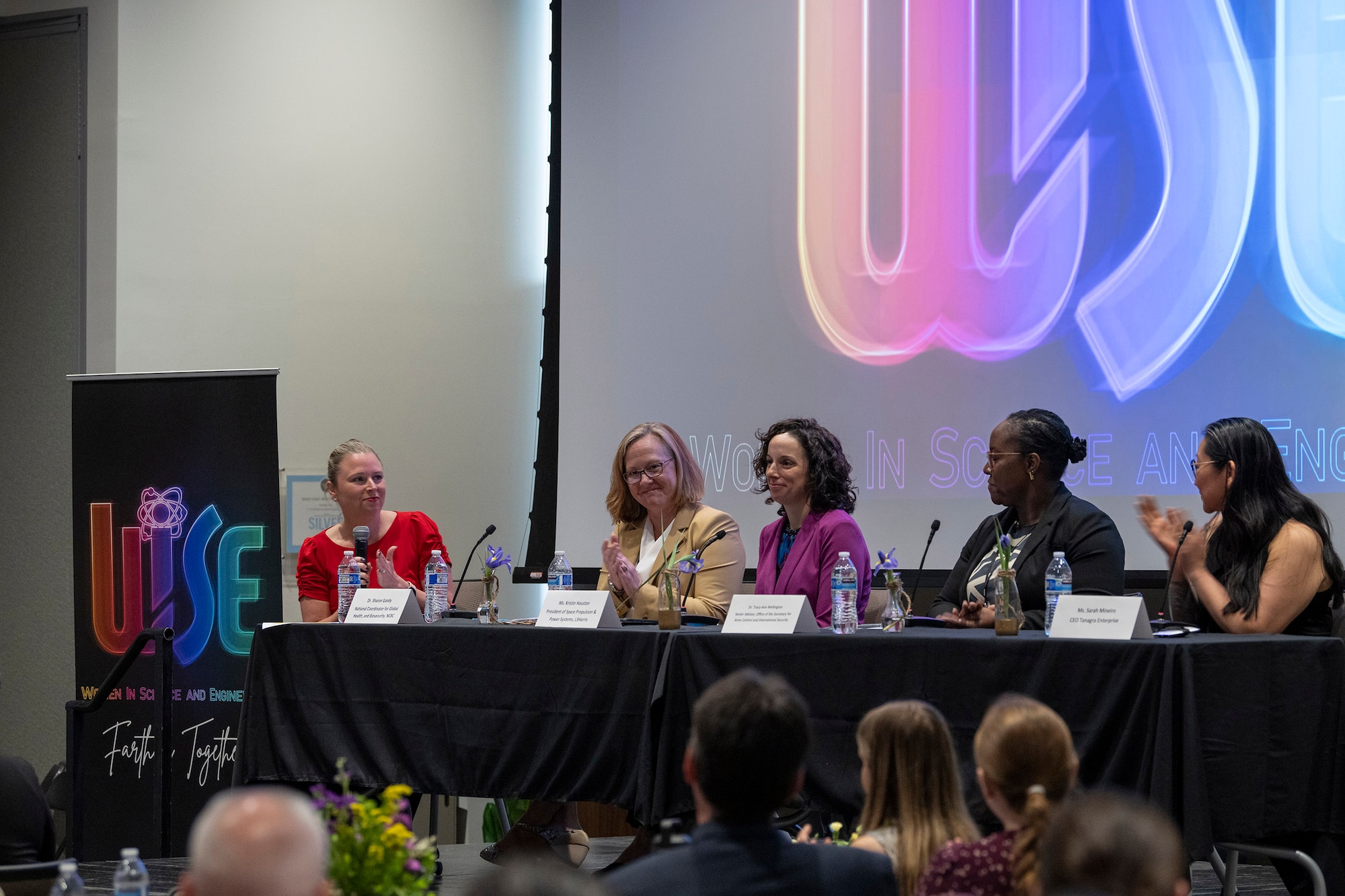 Ms. Aarolyn Hayes (far left), a member of the Air Force Technical Applications Center at Patrick Space Force Base, Fla., moderates an expert panel entitled “Science and Engineering for the Future of Defense” during the 2024 Women in Science and Engineering Symposium March 12 in Rockledge, Fla.  Panel members included (from left to right) Dr. Sharon Gandy, Joint National Coordinator for Global Health and Biosecurity; Kristin Houston, President of Space Propulsion and Power Systems at L3Harris; Dr. Tracey-Ann Wellington, Senior Advisor to the Undersecretary of Arms Control and International Security; and Sarah Mineiro, Chief Executive Officer of Tanagra Enterprises.  AFTAC has hosted the WiSE Symposium since 2014 to highlight and bring attention to the value that gender diversity brings to the science, technology, engineering, and mathematics workforce.  (U.S. Air Force photo by Matthew S. Jurgens)