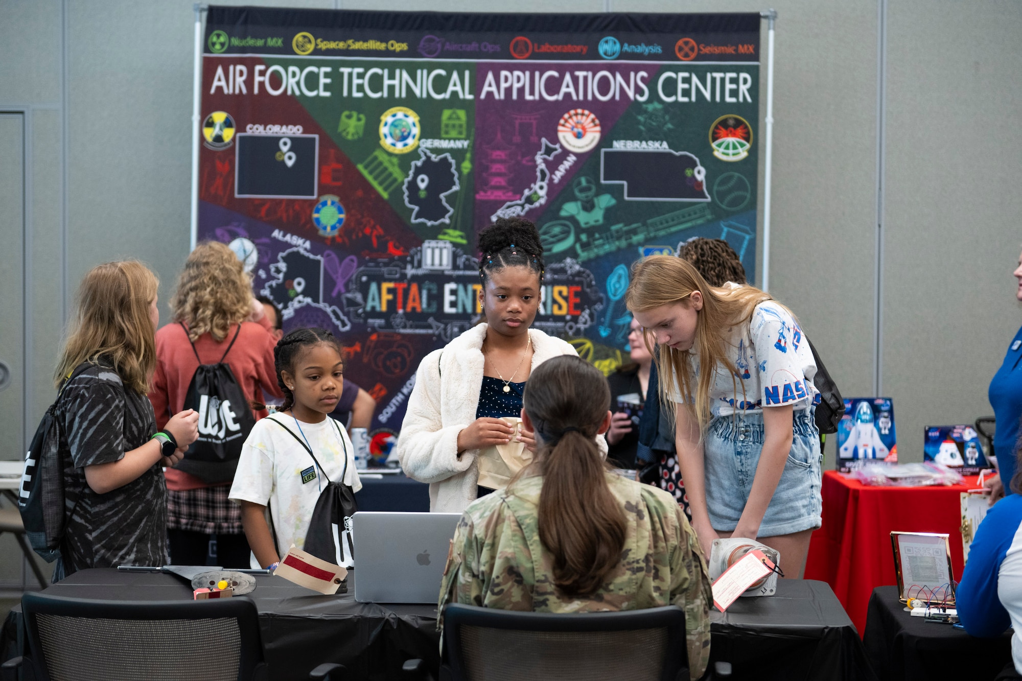 Students from across Brevard County, Fla., converged at the Space Coast Health Foundation for the 2024 Women in Science and Engineering Symposium’s Student Expo March 13, 2024.  Hosted by the Air Force Technical Applications Center, the expo gave attendees the chance to engage with inspiring science, technology, engineering and math leaders, ask questions, advance mentorship opportunities, network with other students, participate in hands-on activities, and enter into STEM team-building competitions.   (U.S. Air Force photo by Matthew S. Jurgens)