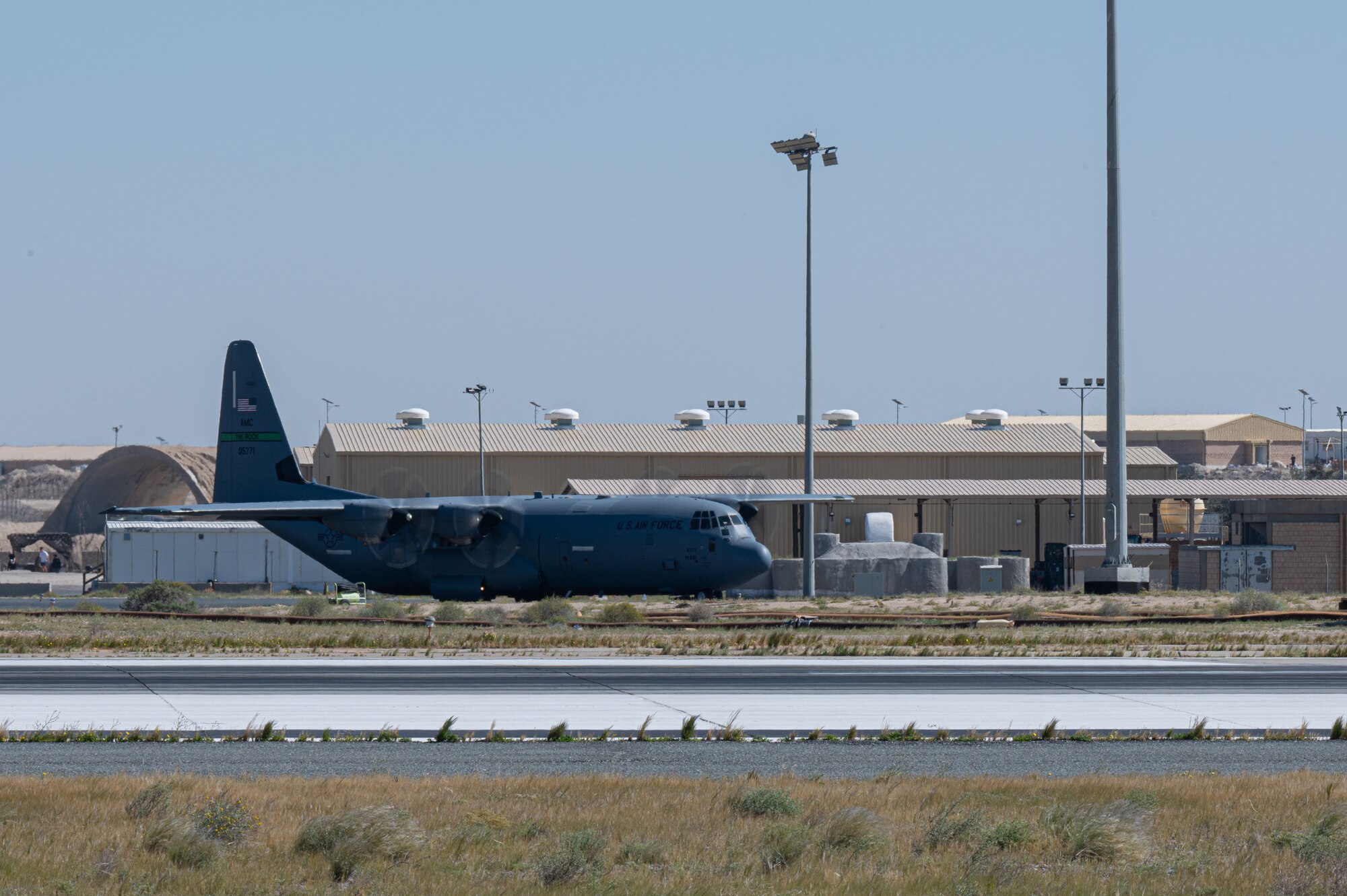 A C-130 loaded with humanitarian aid bound for airdrop over Gaza taxis for takeoff.