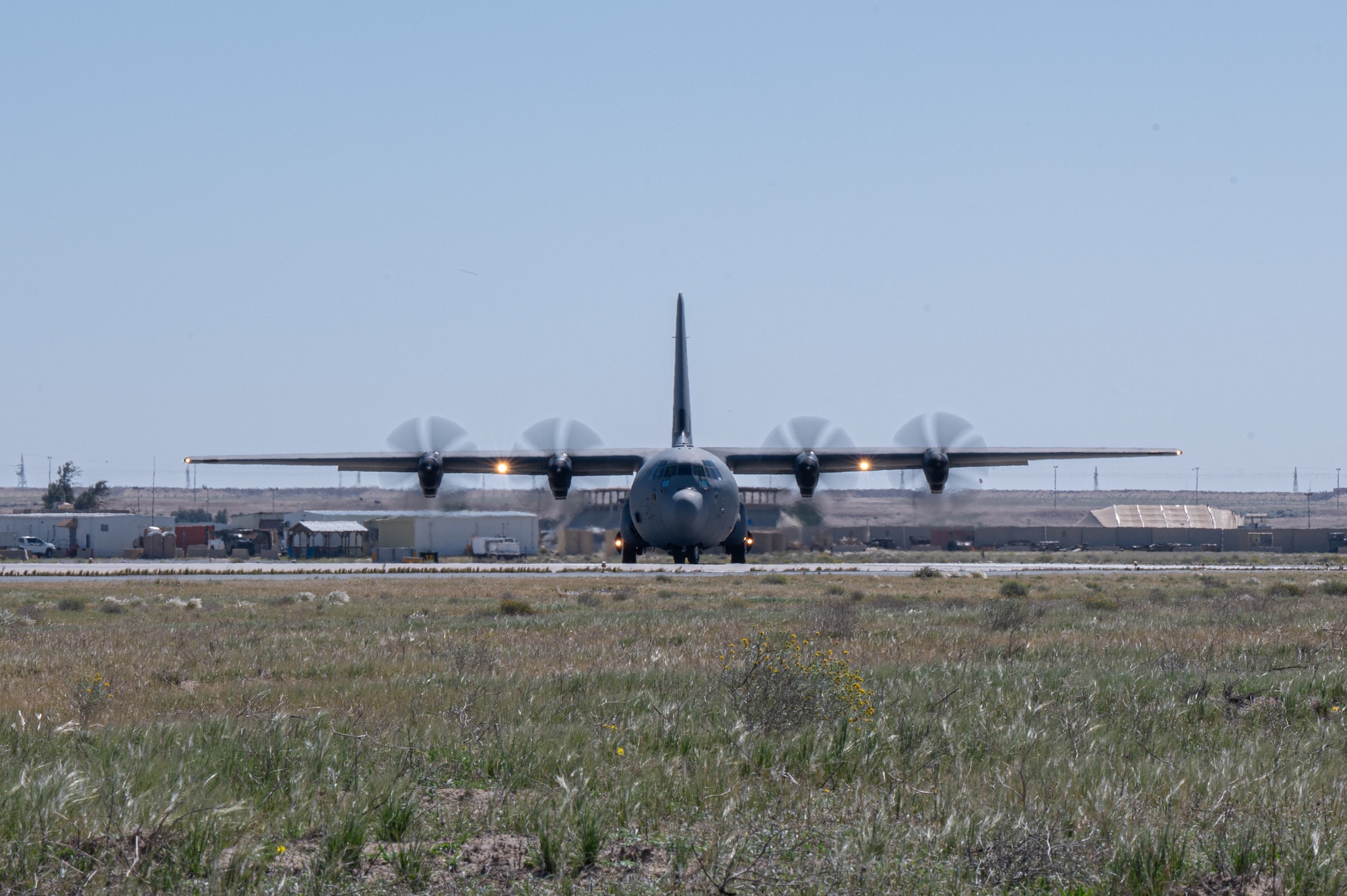 A C-130 loaded with humanitarian aid destined for Gaza taxis for takeoff.