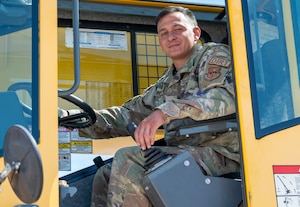U.S. Air Force Staff Sgt. Kevin Alvaran, 49th Civil Engineer Squadron pavement and equipment craftsman, poses for a photo at Holloman Air Force Base, New Mexico, March 21, 2024. Known affectionately as Dirt Boyz, these Airmen perform a variety of tasks, including foreign object debris sweeps, patchwork on roads, parking lots, and runways, placement of gravel and dirt and trench excavation for electrical and plumbing lines. (U.S. Airforce photo by Airman 1st Class Michelle Ferrari)