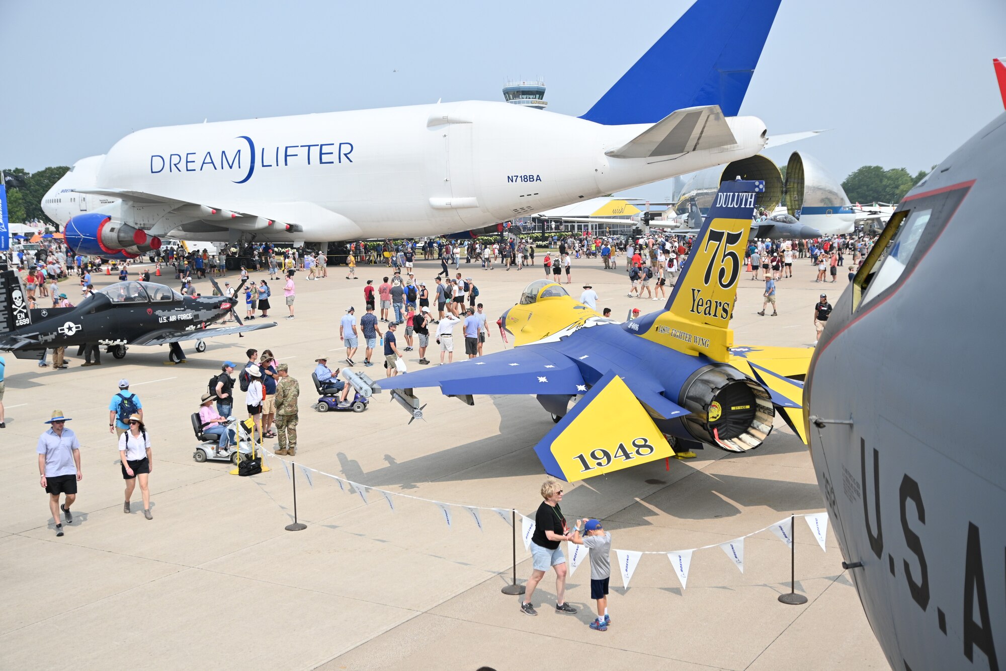 The 148th Fighter Wing's heritage F-16 was a static display at the Experimental Aircraft Association's AirVenture 2023 in Oshkosh, Wisconsin in July 2023. The heritage F-16 was painted to showcase prominent features found on both the 148th Fighter and Air National Guard emblems in honor of the 148th Fighter Wing's 75th Anniversary in September 2023.  (U.S. Air National Guard photo by Senior Airman Tylin Rust)