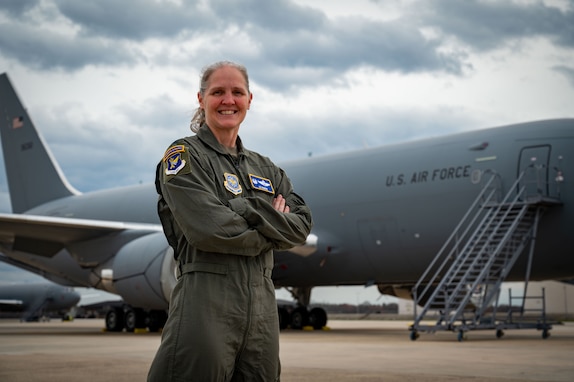 U.S. Air Force Col. Elizabeth Hanson, 305th Air Mobility Wing commander, stands in front of a C-17 Globemaster III at Joint Base McGuire-Dix-Lakehurst, N.J., March 15, 2024.
