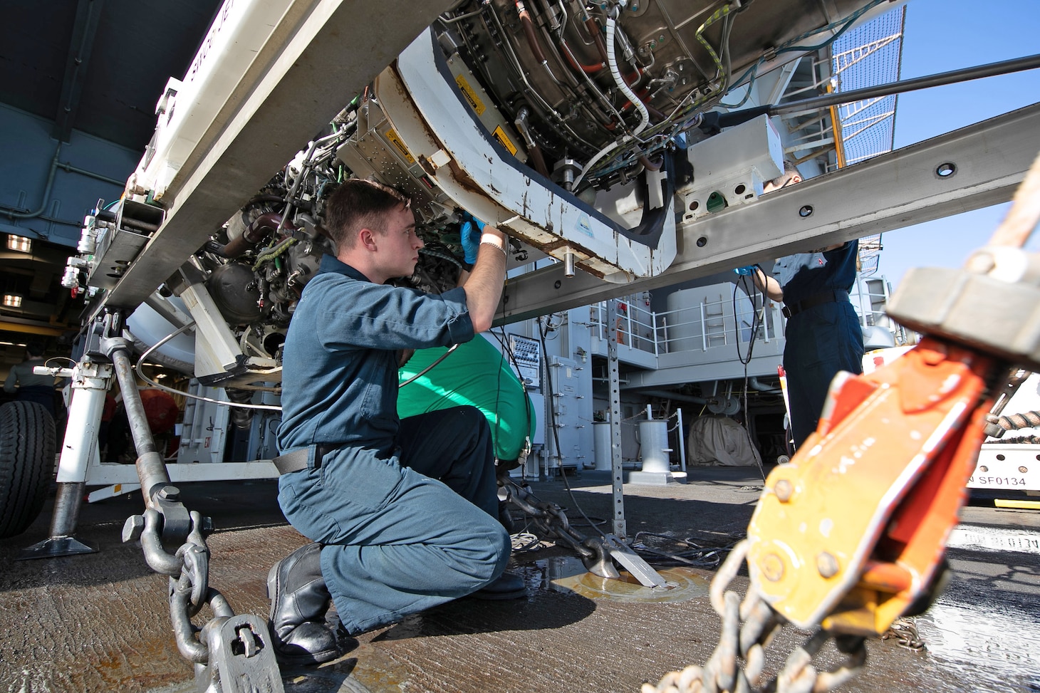 Aviation Machinist's Mate Airman Joseph Davis, from Asheville, North Carolina, assigned to the world's largest aircraft carrier USS Gerald R. Ford's (CVN 78) aircraft intermediate maintenance department (AIMD), prepares an F/A-18 Super Hornet engine to be transported into Gerald R. Ford's engine bay, June 14, 2023. Gerald R. Ford is the U.S. Navy's newest and most advanced aircraft carrier, representing a generational leap in the U.S. Navy's capacity to project power on a global scale. The Gerald R. Ford Carrier Strike Group is on a scheduled deployment in the U.S. Naval Forces Europe area of operations, employed by U.S. Sixth Fleet to defend U.S., allied, and partner interests.