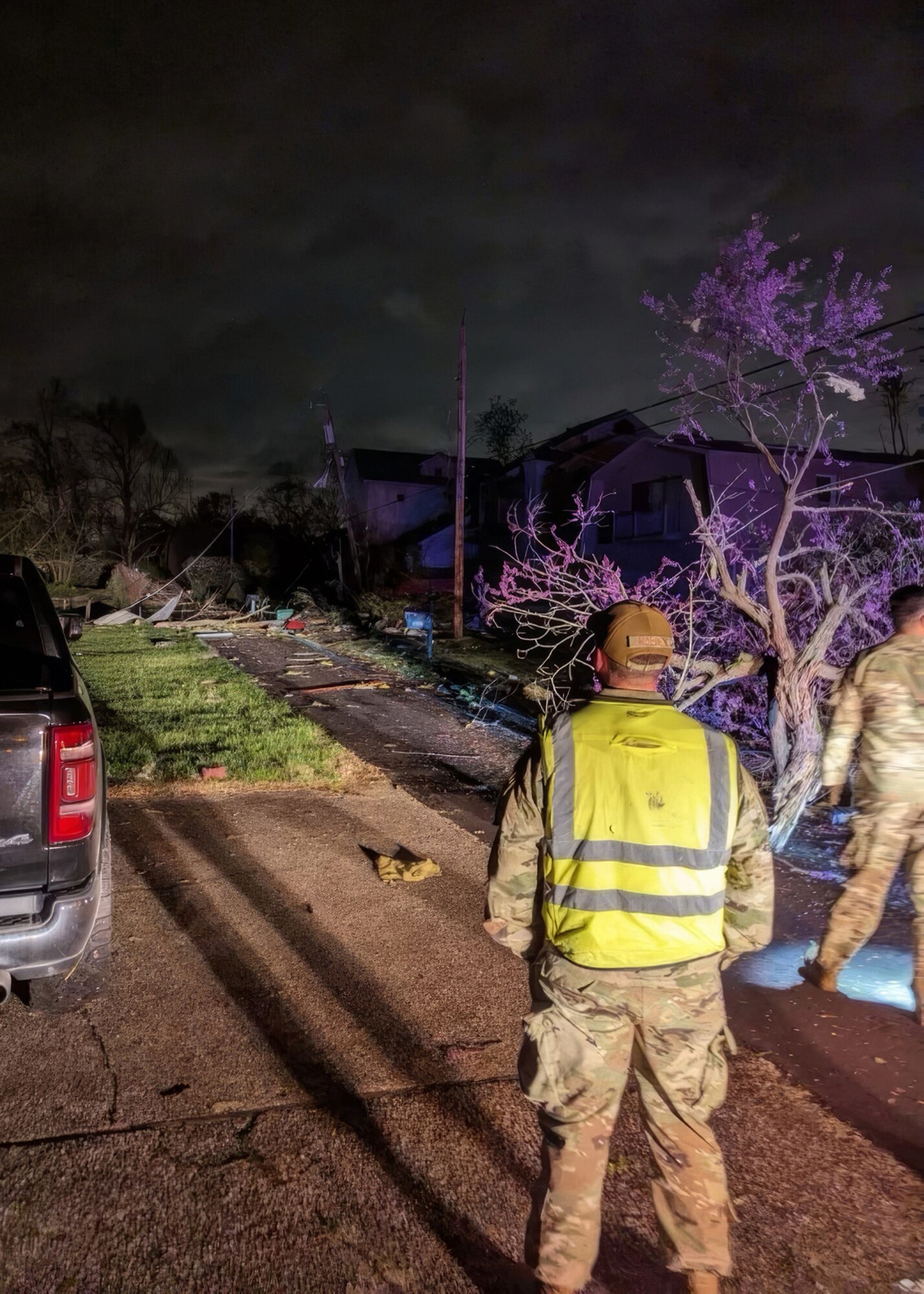 Fourteen members of the Kentucky Air National Guard’s 123rd Civil Engineer Squadron and 123rd Logistics Readiness Squadron clear roadways in Prospect, Ky., April 3, 2024, after multiple tornados touched down in the region. The Airmen removed multiple fallen trees that blocked access to about 100 homes. (U.S. Air National Guard photo by Senior Master Sgt. Brandon Hall)
