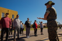 U.S. Marine Corps drill instructor with Support Battalion, Recruit Training Regiment, instructs educators with Recruiting Stations’ Albuquerque, Denver, Houston, and Salt Lake City on close-order drill as part of the 2024 Educator’s Workshop, April 2, 2024 at Marine Corps Recruit Depot San Diego, California. Participants of the workshop visit MCRD San Diego to observe recruit training and gain a better understanding about the transformation from recruits to United States Marines. Educators also received classes and briefs on the benefits that are provided to service members serving in the United States armed services. (U.S. Marine Corps photo by Sgt. Trey Q. Michael)