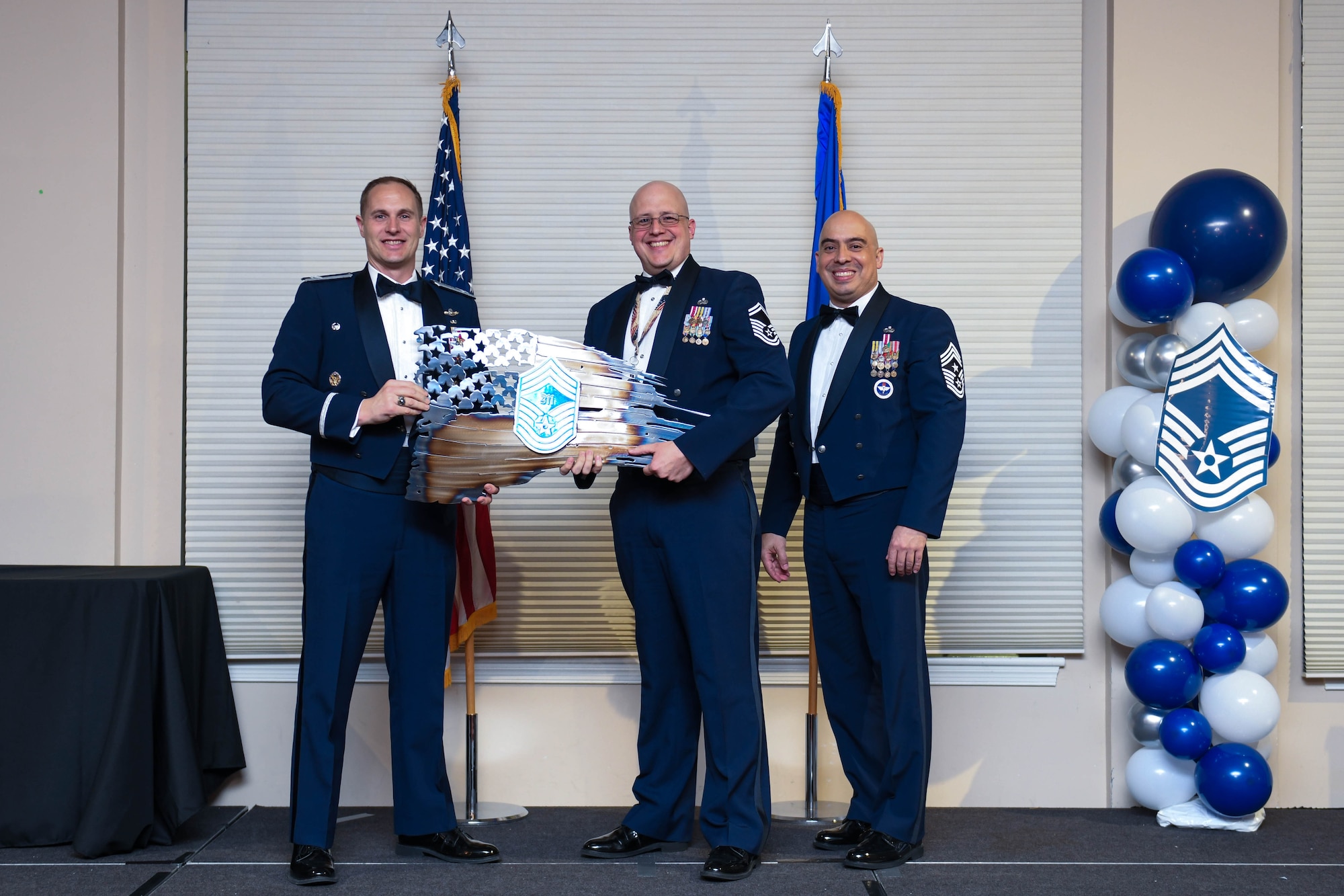 U.S. Air Force Chief Master Sgt. Benjamin Griffin, select, with the 916th Air Refueling Wing, poses for a photo during the chief master sergeant recognition ceremony at Seymour Johnson Air Force Base, North Carolina, March 2, 2024. Members from all over Seymour Johnson AFB gathered to recognize three senior noncommissioned officers promoted to the rank of chief master sergeant in the 2023 cycle. (U.S. Air Force photo by Senior Airman Taylor Hunter)