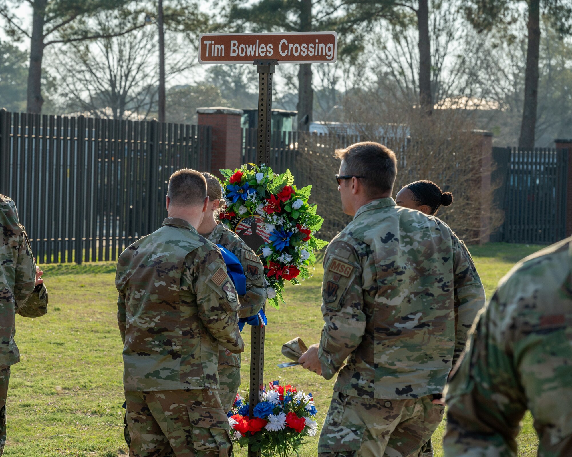U.S. Air Force Airmen assigned to the 4th Fighter Wing, converse and honor Staff Sgt. Timothy Bowles’ Memorial at Seymour Johnson Air Force Base, North Carolina, March 15, 2024. For his sacrifice Staff Sgt. Timothy Bowles was posthumously awarded the Purple Heart and Bronze Star. (U.S. Air Force photo by Airman 1st Class Leighton Lucero)
