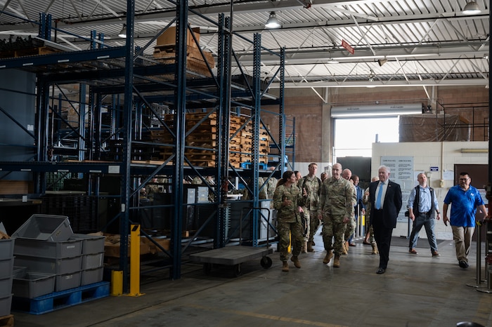 Lt. Col. Monica Moriarity, 647th Logistics Readiness Squadron commander, gives Air Force leaders a tour of Team Hickam’s mobility processing center during a base visit at Joint Base Pearl Harbor-Hickam, Hawaii, April 1, 2024. Moriarity shared the importance of the MPC’s role during rapid mobility deployments within the Pacific area of responsibility. (U.S. Air Force photo by Staff Sgt. Alan Ricker)