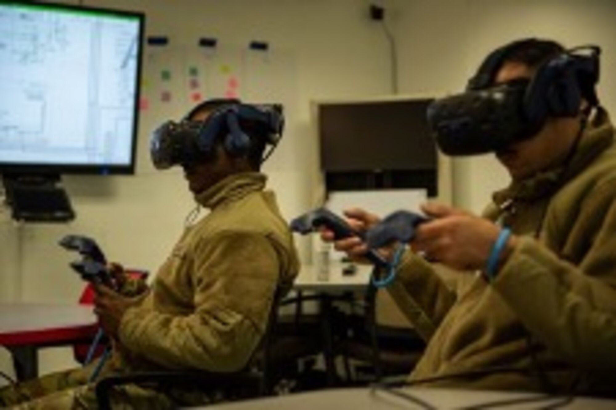 Vehicle Maintenance students assigned to the 346th Training Squadron experience the SCALE-UP classroom on Feb. 14, at Port Hueneme, Calif. The student-Centered Activity Learning Environment-Upside Down Pedagogy or SCALE-UP's primary objective is to spearhead the development of a front-line training program for 2T3 Vehicle Management specialties. (U.S. Air Force Photo by Jonathan Cotto)