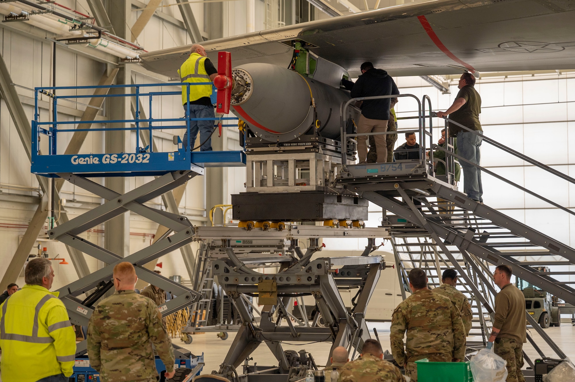 Boeing Contractors and Airman from the 22nd Maintenance Group attach a Wing Aerial Refueling Pod (WARP) onto a KC-46A Pegasus March 5, 2024, at McConnell Air Force Base, Kansas.