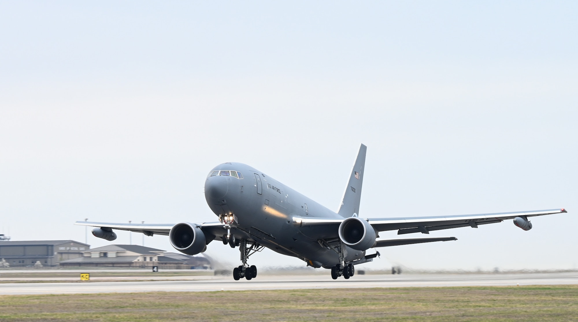 A KC-46A Pegasus with Wing Aerial Refueling Pods attached takes off March 13, 2024, from McConnell Air Force Base, Kansas.