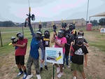 young paintball players cheer