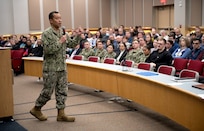 Rear Adm. Kenneth Epps, commander, Naval Supply Systems Command (NAVSUP) and Chief of Supply Corps, speaks with military and civilian personnel during a command visit to NAVSUP Business Systems Center (BSC) onboard Naval Support Activity Mechanicsburg.