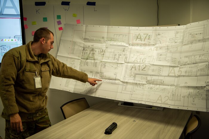 Airman Gryphyn Meltzer, student assigned to the 346th Training Squadron, experiences the SCALE-UP classroom on Feb. 14, at Port Hueneme, Calif. The student-Centered Activity Learning Environment-Upside Down Pedagogy or SCALE-UP's primary objective is to spearhead the development of a front-line training program for 2T3 Vehicle Management specialties. (U.S. Air Force Photo by Jonathan Cotto)