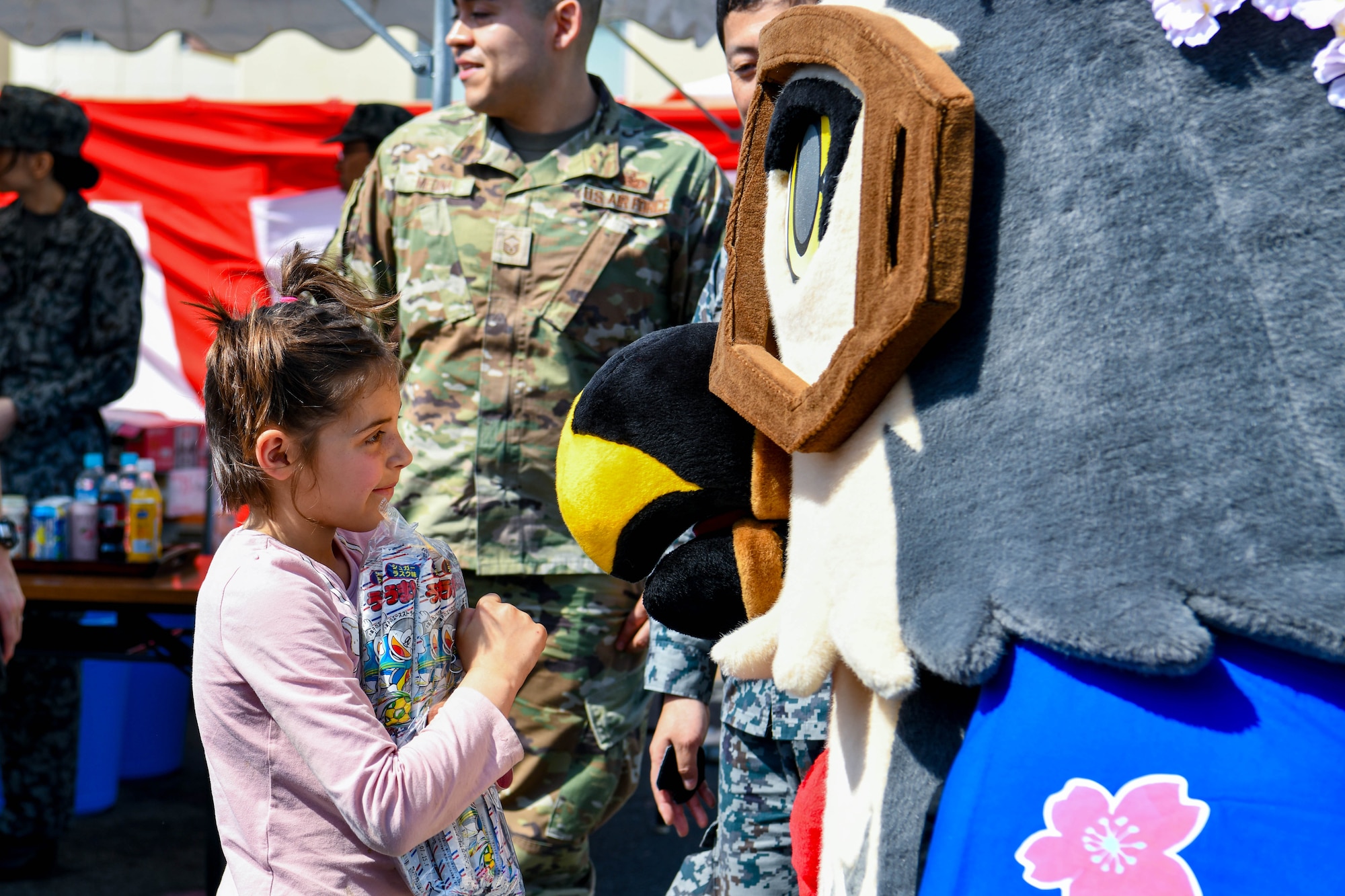 Members of Team Yokota meet with Hayate, Japan Air Self-Defense Force mascot.