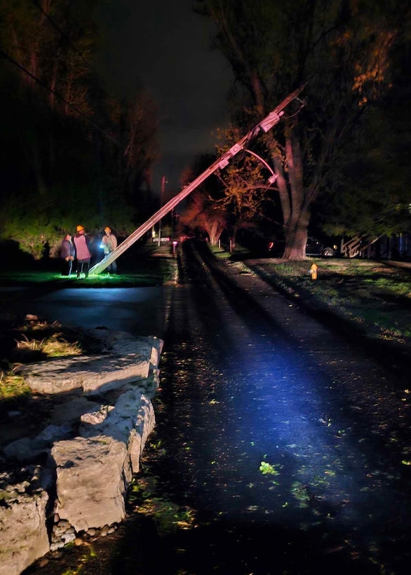 Fourteen members of the Kentucky Air National Guard’s 123rd Civil Engineer Squadron and 123rd Logistics Readiness Squadron clear roadways in Prospect, Ky., April 3, 2024, after multiple tornados touched down in the region. The Airmen removed multiple fallen trees that blocked access to about 100 homes. (U.S. Air National Guard photo by Senior Master Sgt. Brandon Hall)