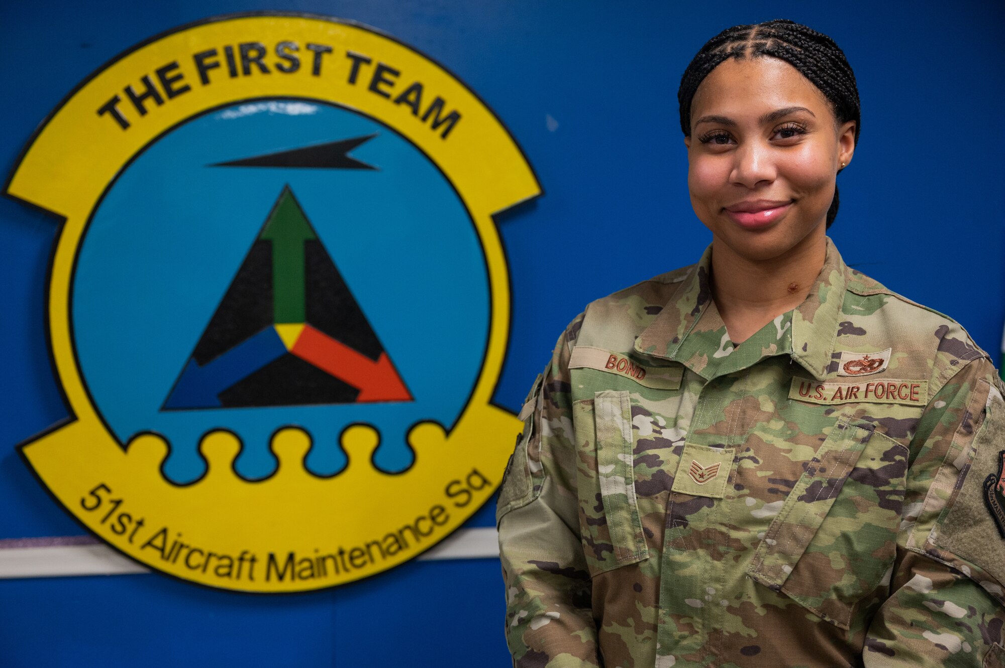 U.S. Air Force Staff Sgt. Courtney Bond, 51st Maintenance Squadron weapon systems coordinator, poses for a photo at Osan Air Base, Republic of Korea, April 1, 2024. Bond plays a crucial role in Osan’s “Fight Tonight” mission, by acting as a liaison between the flight line and any coordination they may need from other base organizations to remain fully mission capable. (U.S. Air Force photo by Airman 1st Class Chase Verzaal)