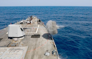 USS Gravely (DDG 107) conducts a pre-action calibration practice fire of its 5-inch gun in the Red Sea.