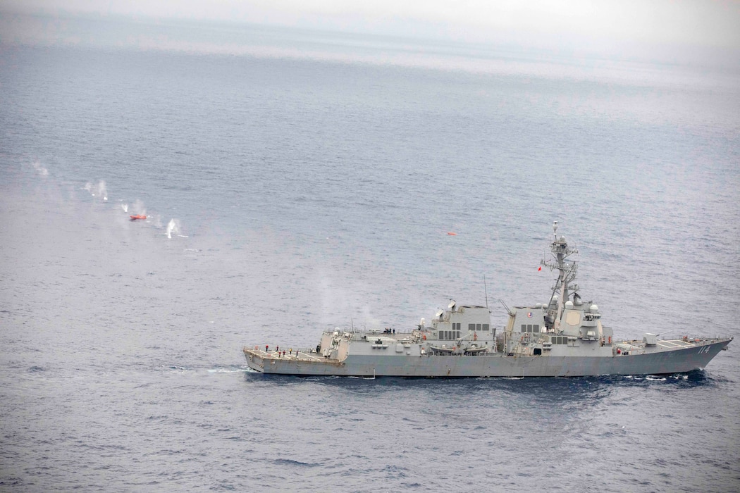 USS Ralph Johnson (DDG 114) live-fire exercise in the Philippine Sea.