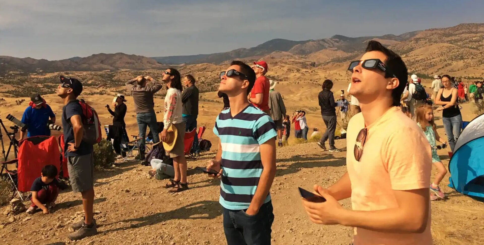 Spectators must wear approved “eclipse glasses” while viewing the solar eclipse to avoid permanently injuring their eyes. There is only one safe way to look directly at the sun, whether during an eclipse or not: through special-purpose solar filters, according to the American Academy of Ophthalmology. These solar filters are used in eclipse glasses or in hand-held solar viewers. They must meet a very specific worldwide standard known as ISO 12312-2.