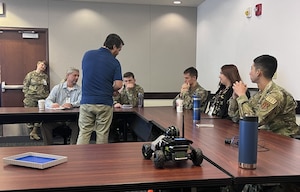 Instructor Vance Oas demonstrates the operation of the Rover Revolution to Air Force Operational Test and Evaluation Center 401 Course students.