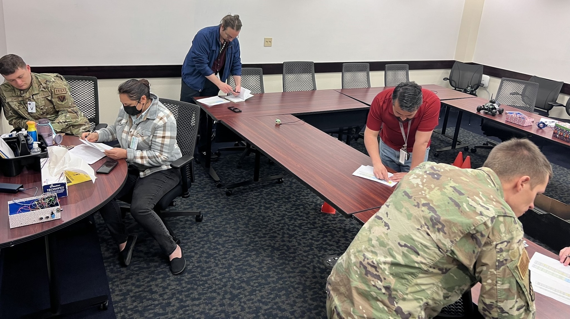 Course instructors review student generated run cards outlining expected test configurations ahead of execution start. These cards outline the starting conditions and required data for collection during a test run.