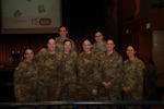 Attendees of the Wisconsin Army National Guard's first ever Women's Symposium pose together for a photo during a break, March 29, 2024. The events focus was on reinforcing the organization's commitment to gender equality and empowering leaders, women, and allies to advocate for one another. (U.S. National Guard photo by Staff Sgt. Amber Peck)